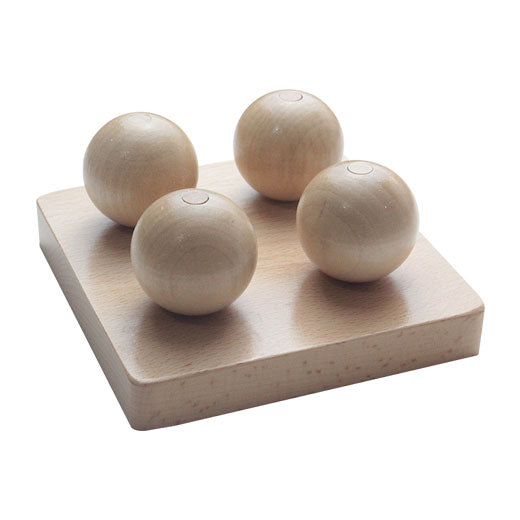 Four Balls on Small Pegs